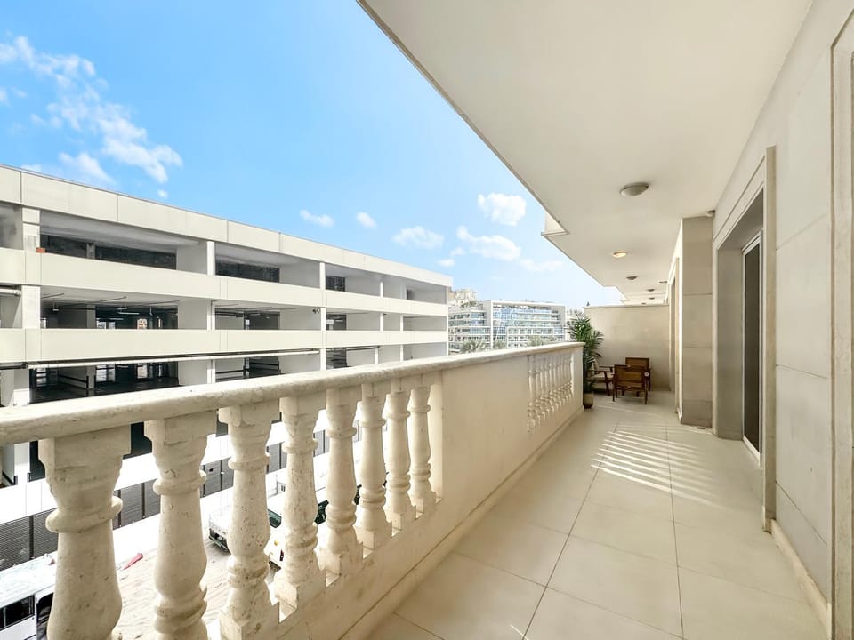Stylish JVC 2BR Stay with Guest Room Rose Gold Accents Apartment in Dubai