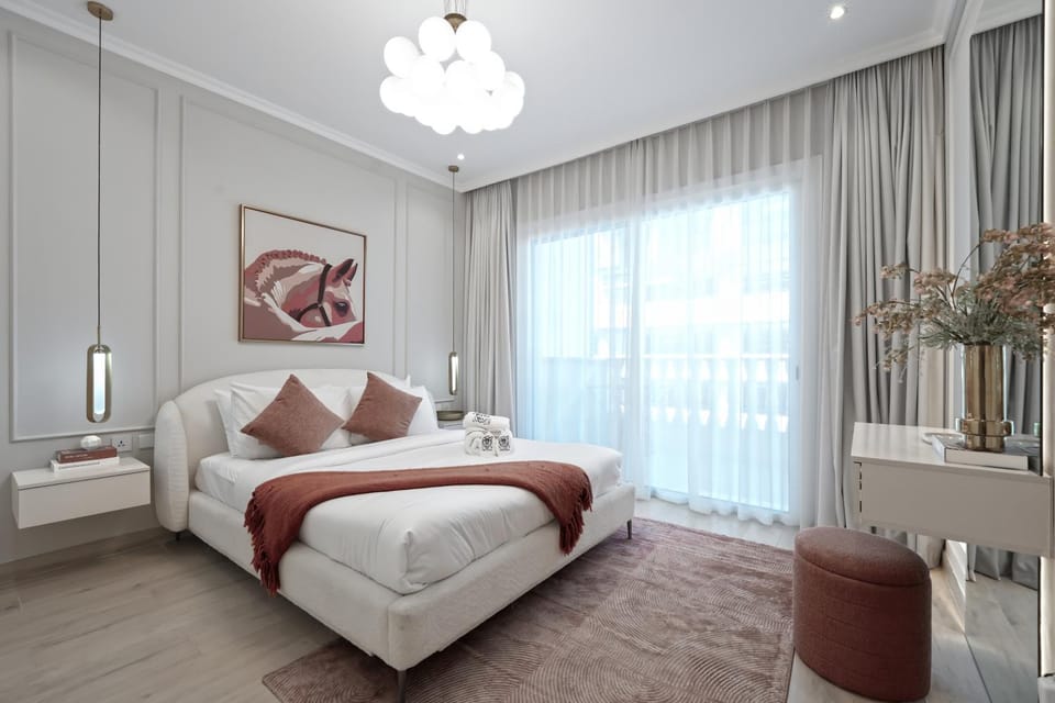 Stylish JVC 2BR Stay with Guest Room Rose Gold Accents Apartment in Dubai
