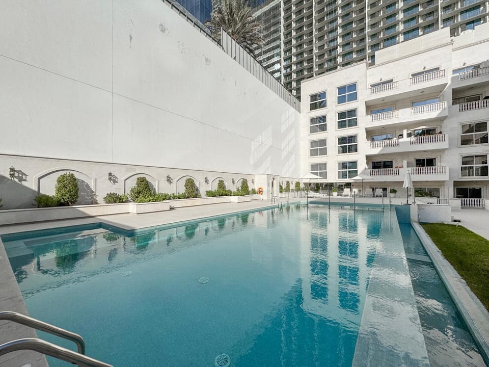 Stylish JVC 2BR Stay with Guest Room Rose Gold Accents Apartment in Dubai