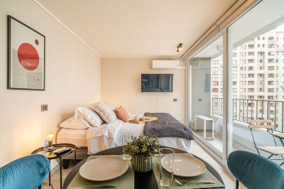 HOM I WifiAireAcond Centrico SmartTv PiscinaCowork Apartment in Santiago