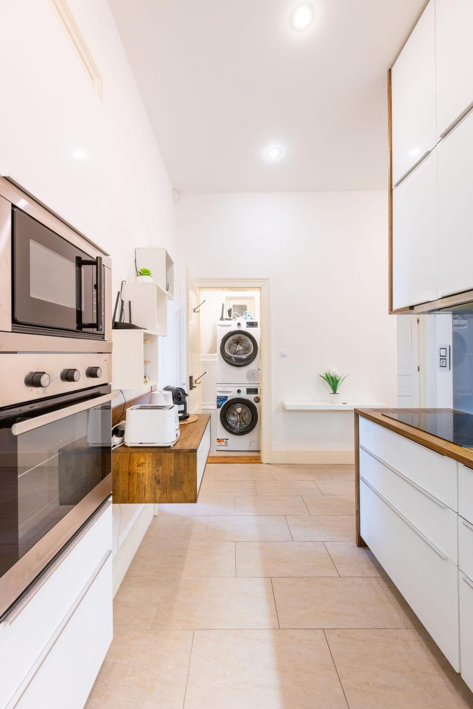 Kitchen or kitchenette, dishwasher, oven, stove, toaster