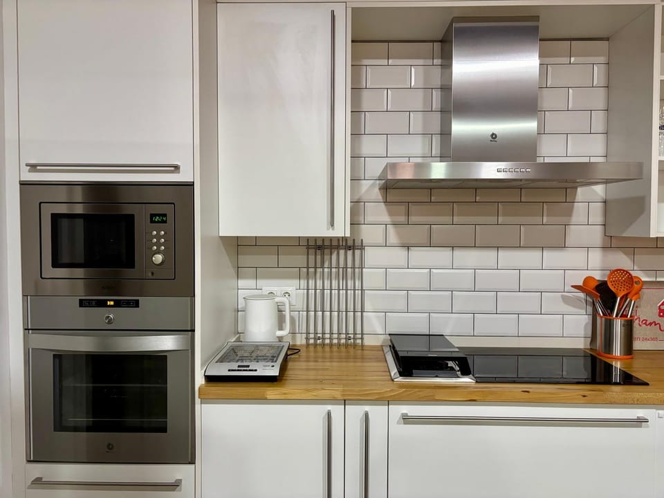 Kitchen or kitchenette, oven, stove