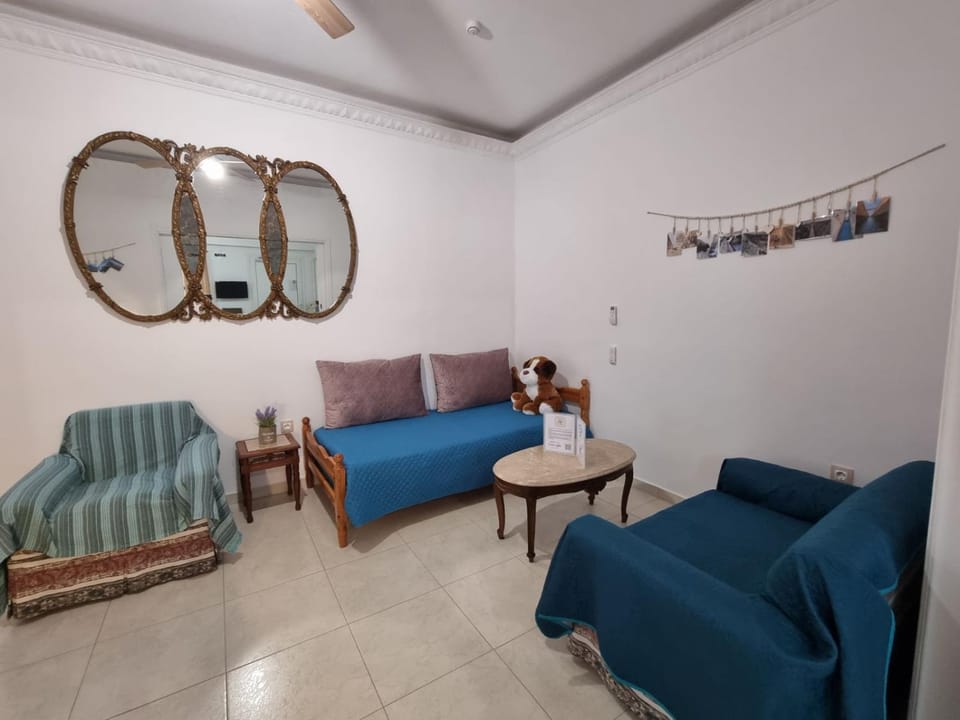 Bed, Living room, Seating area, Bedroom