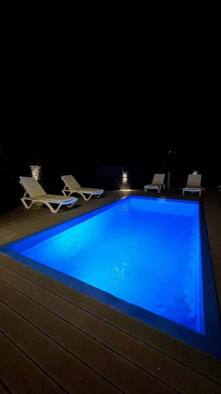 Night, Pool view, Swimming pool, sunbed