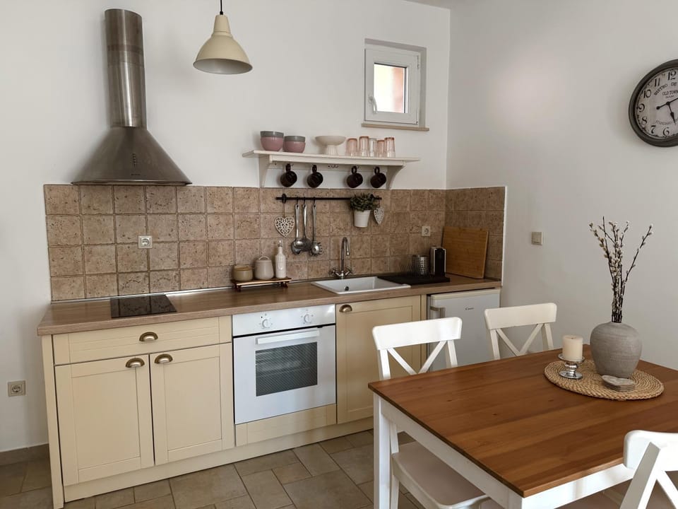 Kitchen or kitchenette, stove, toaster