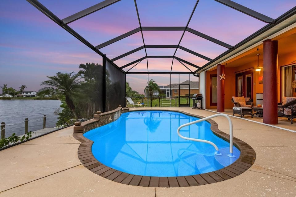 Heated Pool and Backs onto Freshwater Lake - Billie House in Cape Coral