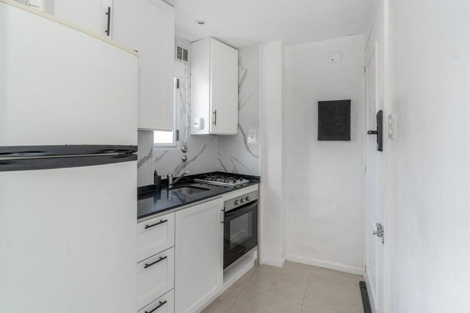 Kitchen or kitchenette, oven, stove