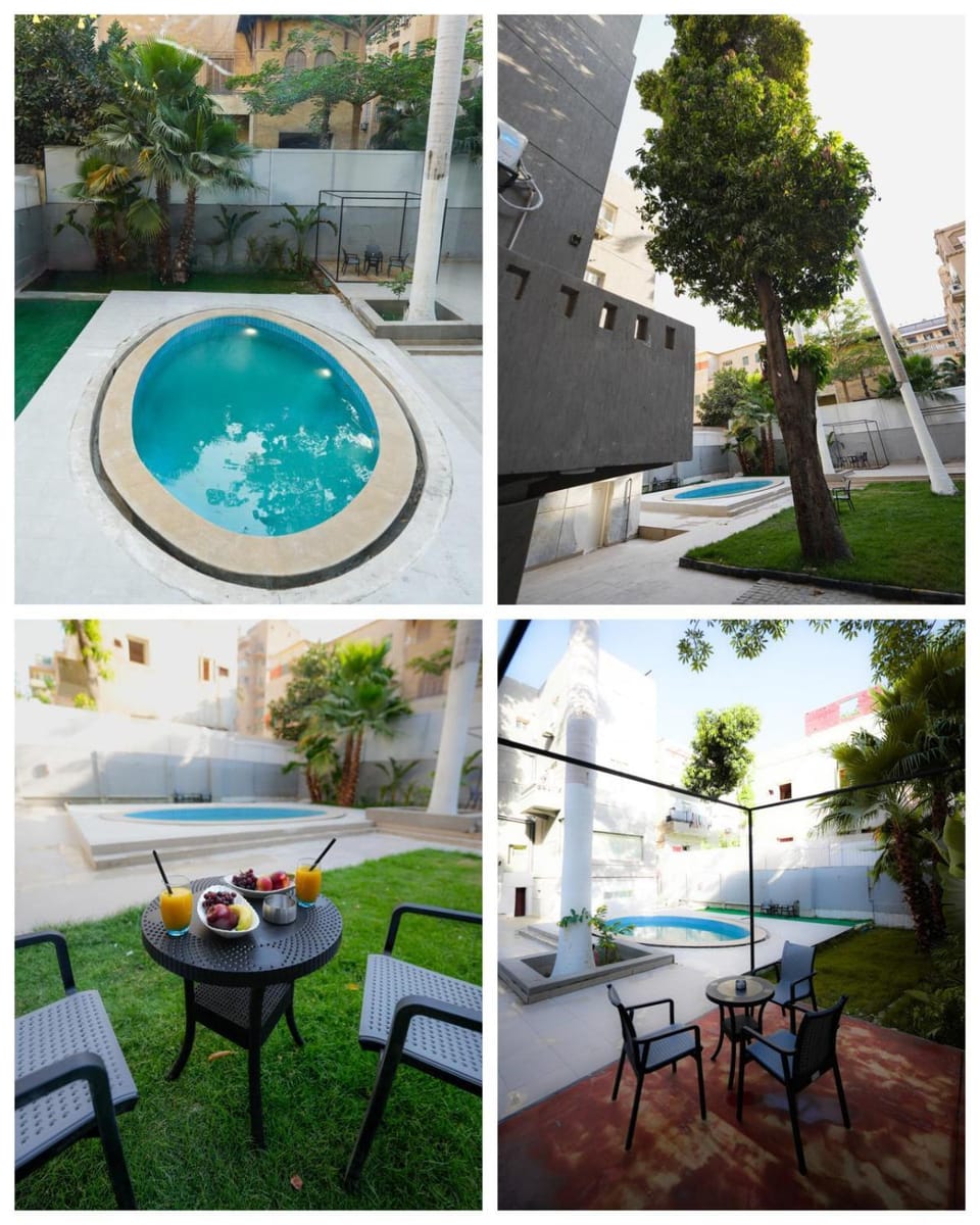 Property building, Patio, Day, Natural landscape, Garden, Dining area, Garden view, Pool view, Swimming pool