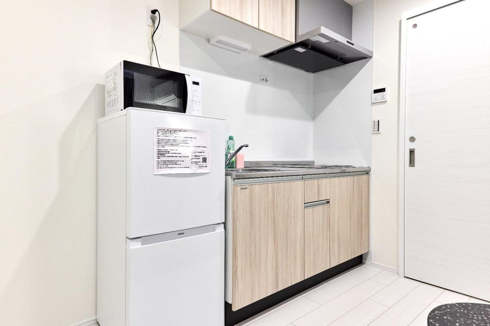 Kitchen or kitchenette, microwave