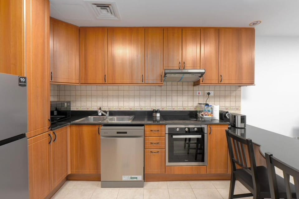 Kitchen or kitchenette, Dining area, dishwasher, oven, stove, toaster