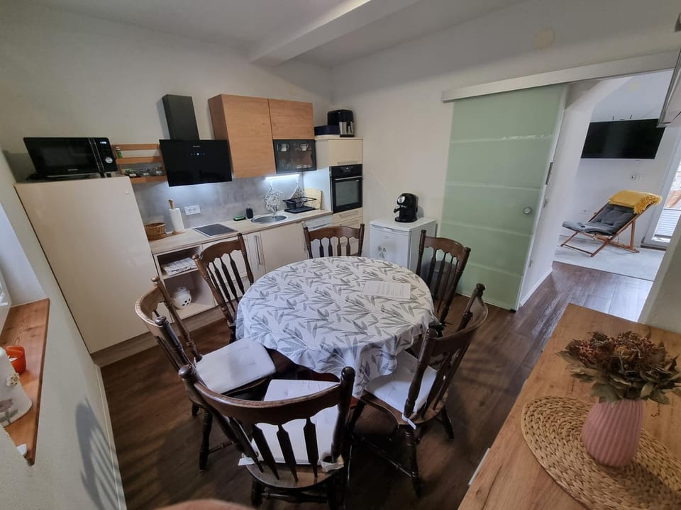 Dining area, oven, kitchen