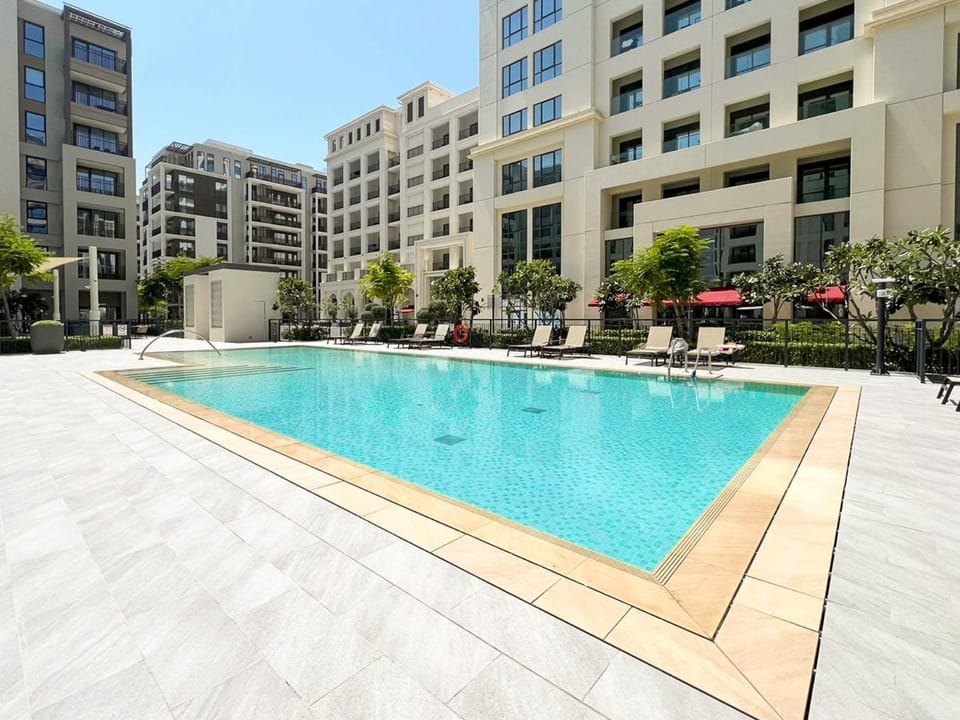 Modern 1BR Apartment Near Creek Beach with Pool & Balcony - Holiday Boulevard Apartment in Dubai