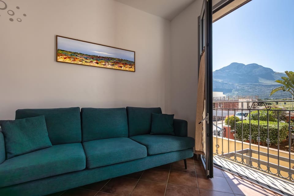 Natural landscape, View (from property/room), Living room, Seating area, Mountain view
