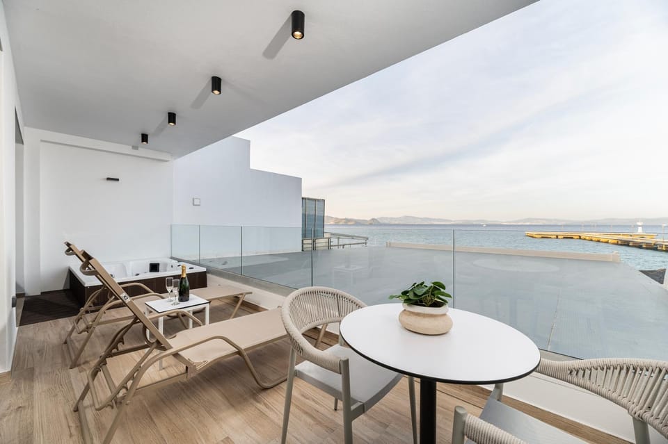 Property building, Patio, Day, Natural landscape, View (from property/room), Balcony/Terrace, Balcony/Terrace, Seating area, Beach, Sea view