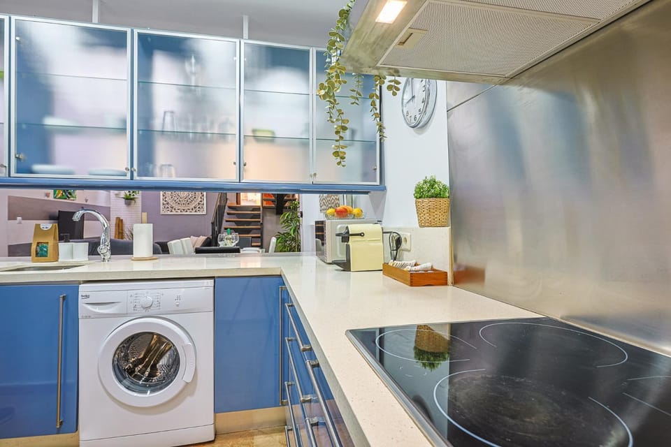 Kitchen or kitchenette, dishwasher, oven, stove, washing machine, dryer