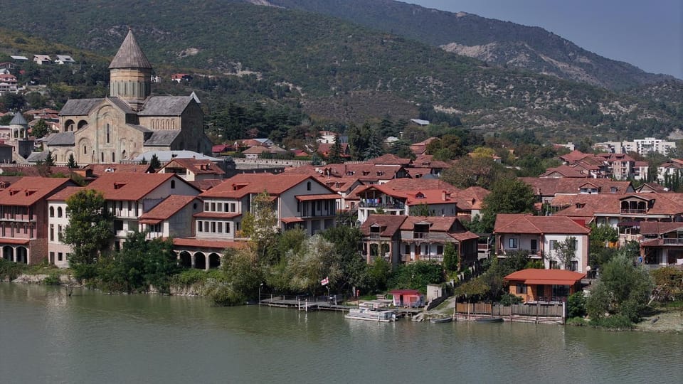 Property building, Nearby landmark, Day, Natural landscape, Mountain view, River view
