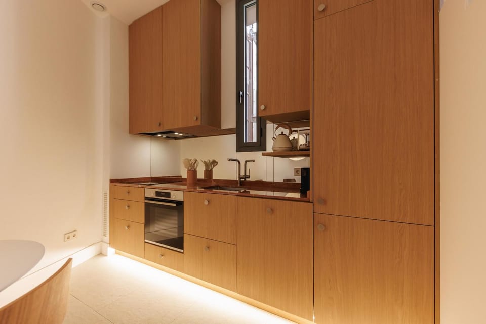 Kitchen or kitchenette, dishwasher, oven, stove