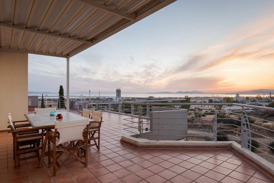 View (from property/room), Balcony/Terrace, Dining area, Sunset