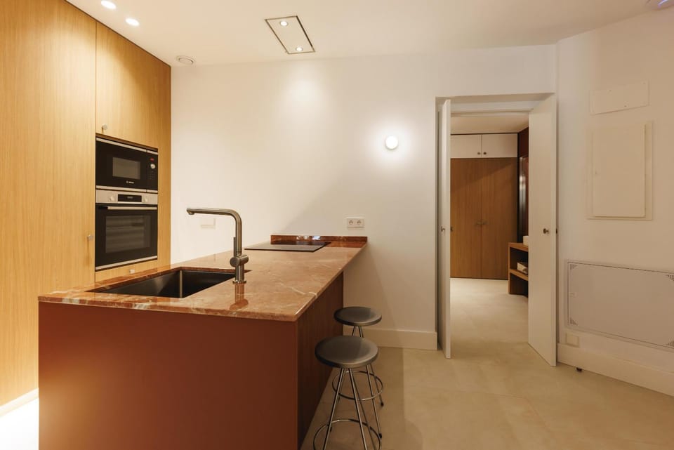 Kitchen or kitchenette, oven, stove