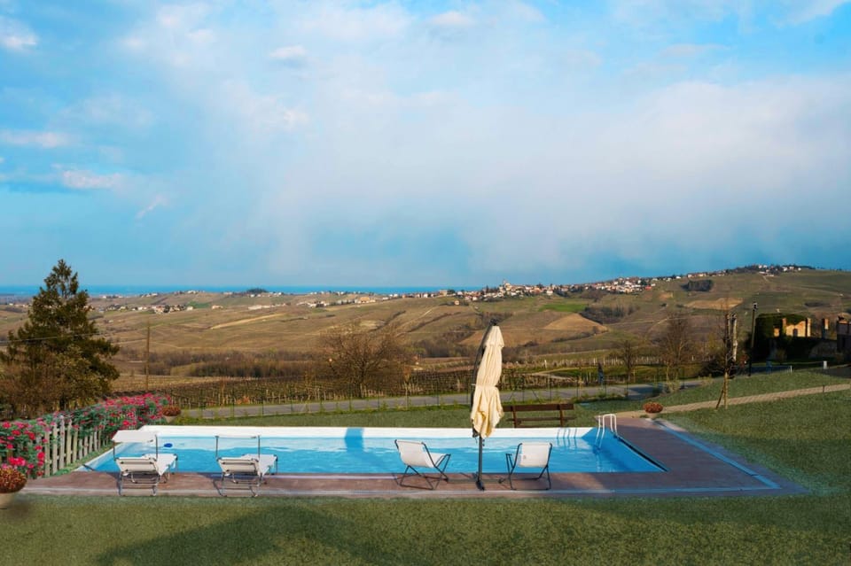 Property building, Living room, Swimming pool