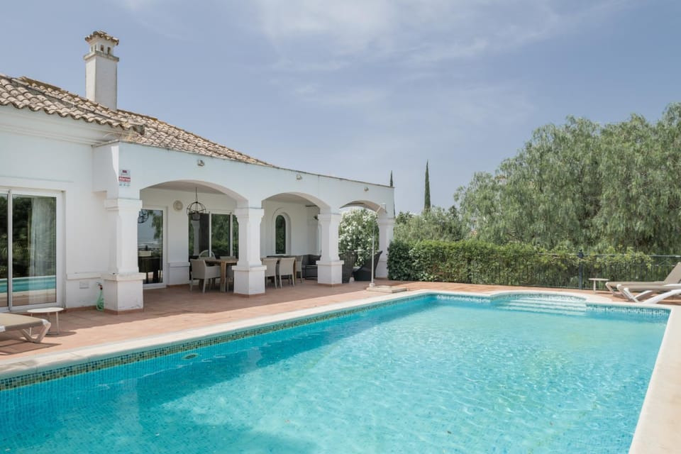 Property building, Living room, Swimming pool