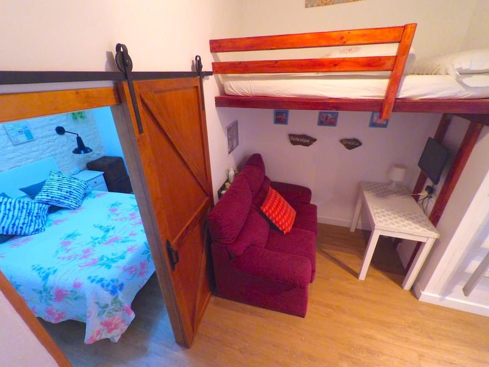Bed, Seating area, Bedroom