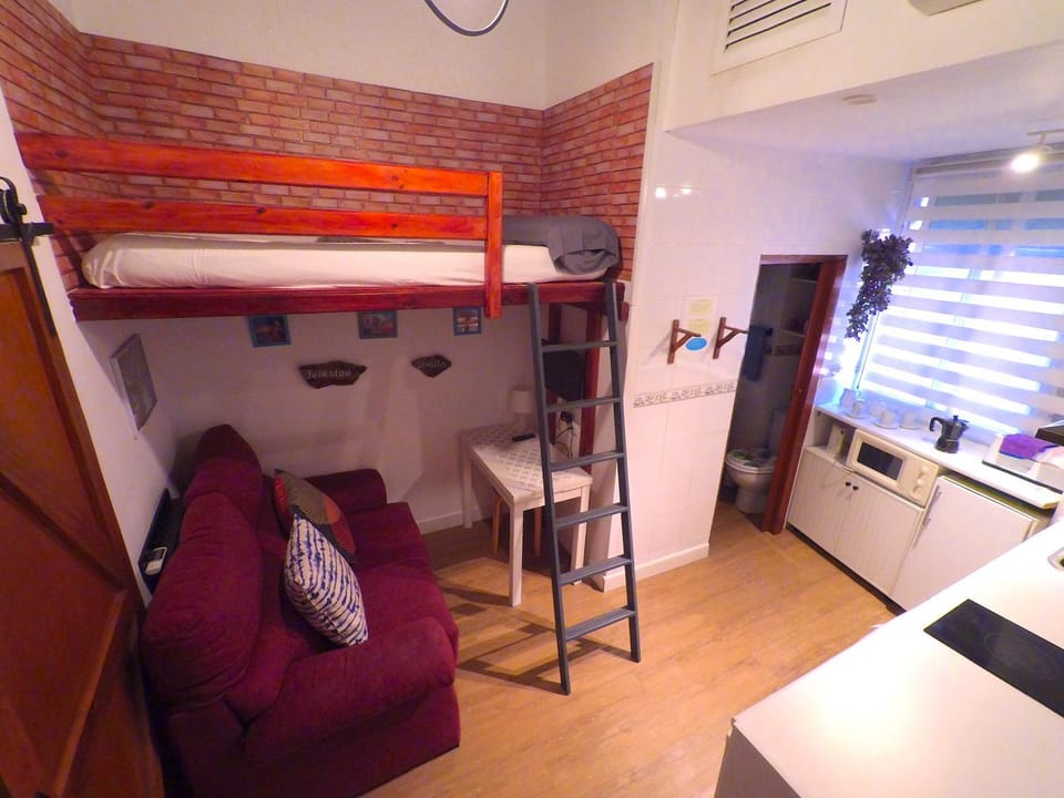 Bed, Living room, Seating area, Bedroom