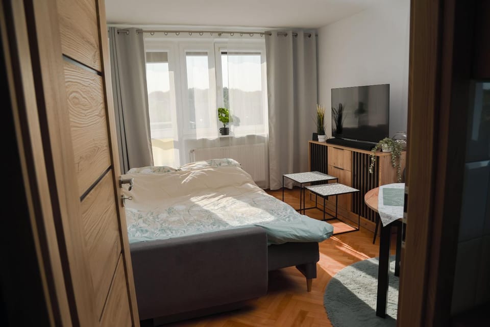 Bed, Living room, Seating area, Sunset