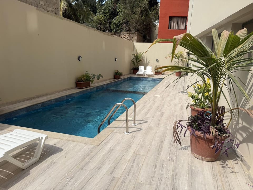 Swimming pool, sunbed