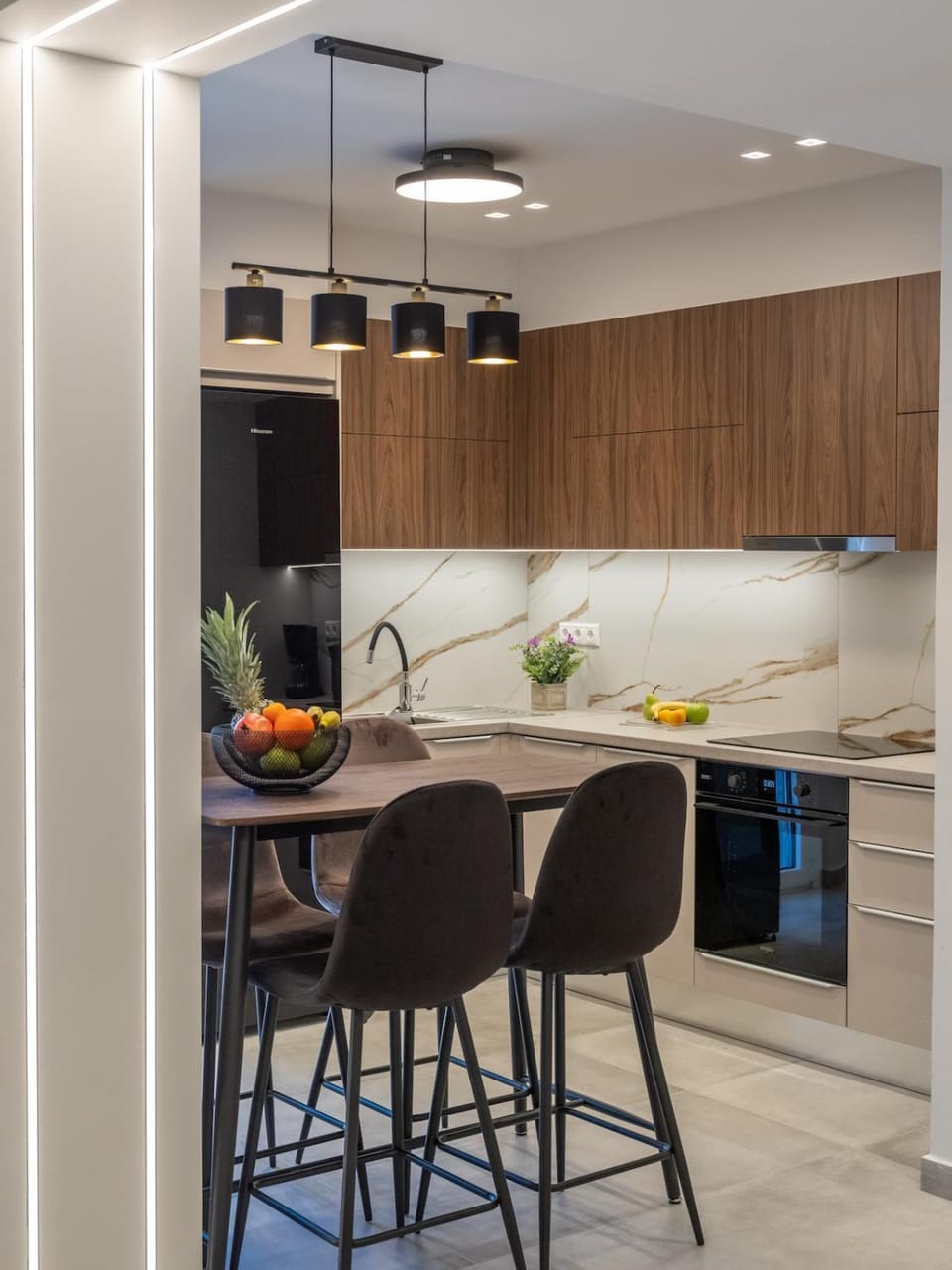 Kitchen or kitchenette, dishwasher, oven, stove