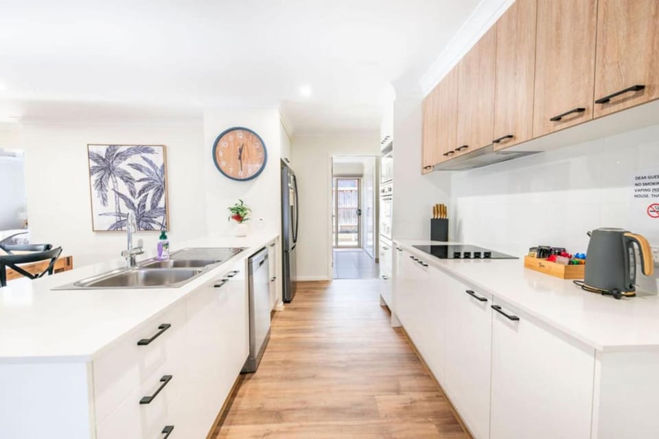 Kitchen or kitchenette, dishwasher, oven, stove, toaster