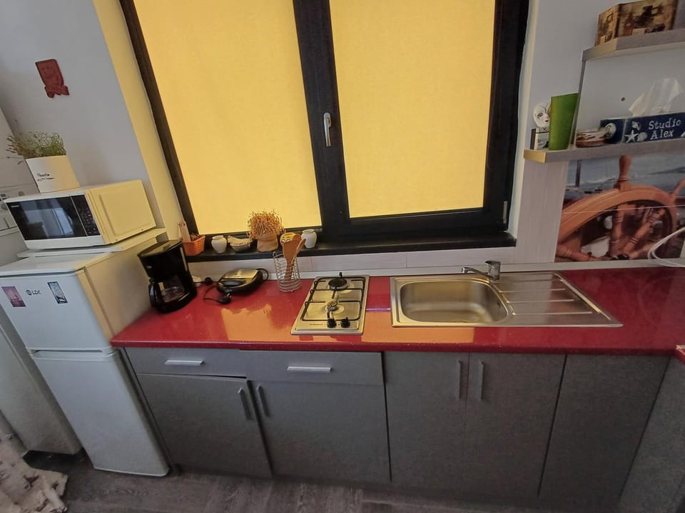 Kitchen or kitchenette, stove