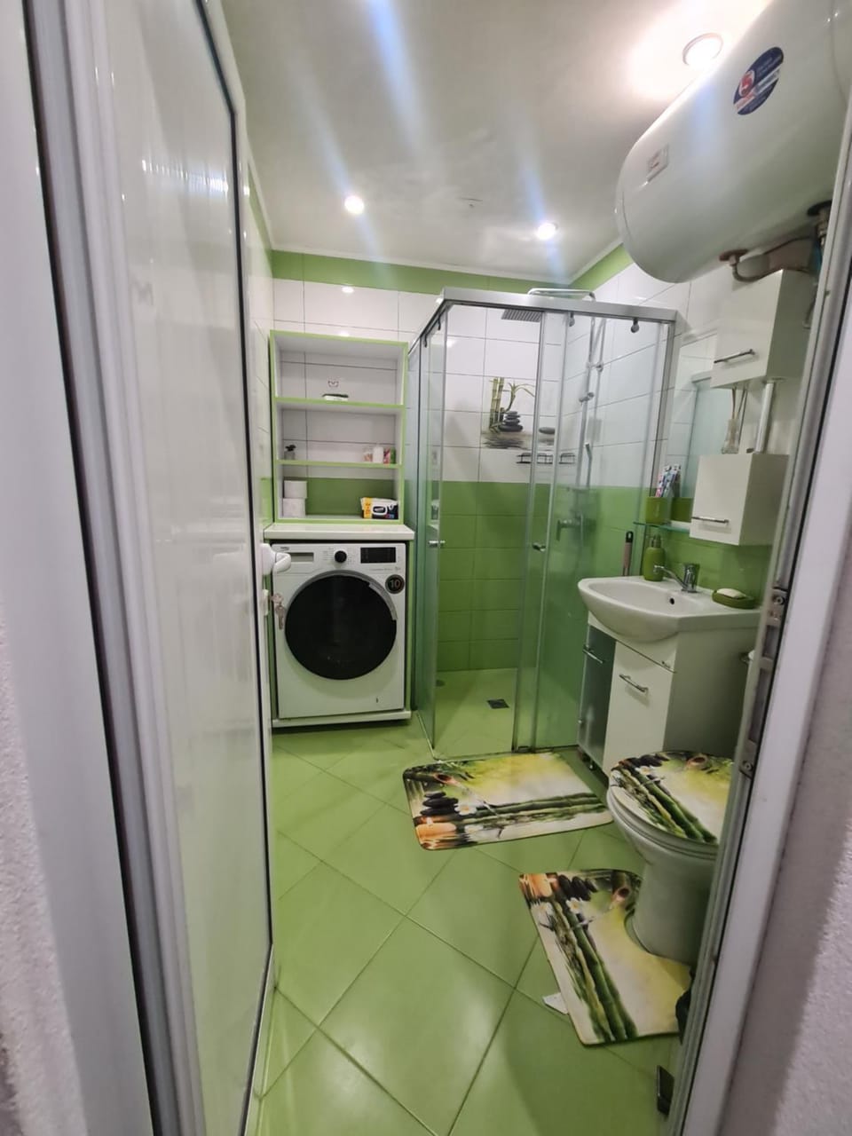 Shower, Toilet, Bathroom, towels, washing machine, dryer