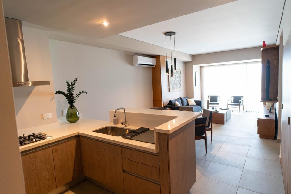 Kitchen or kitchenette, Living room, Seating area, Dining area, air conditioner