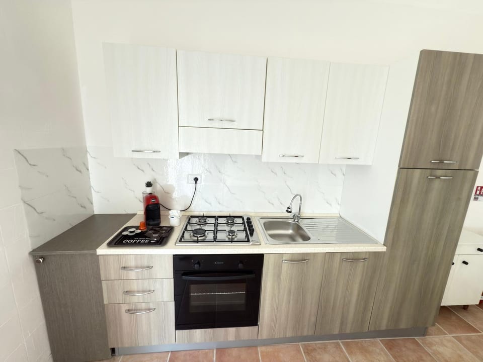 Kitchen or kitchenette, stove