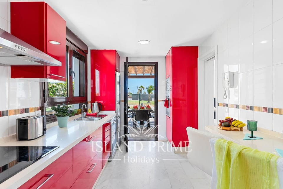 Kitchen or kitchenette, dishwasher, oven, stove