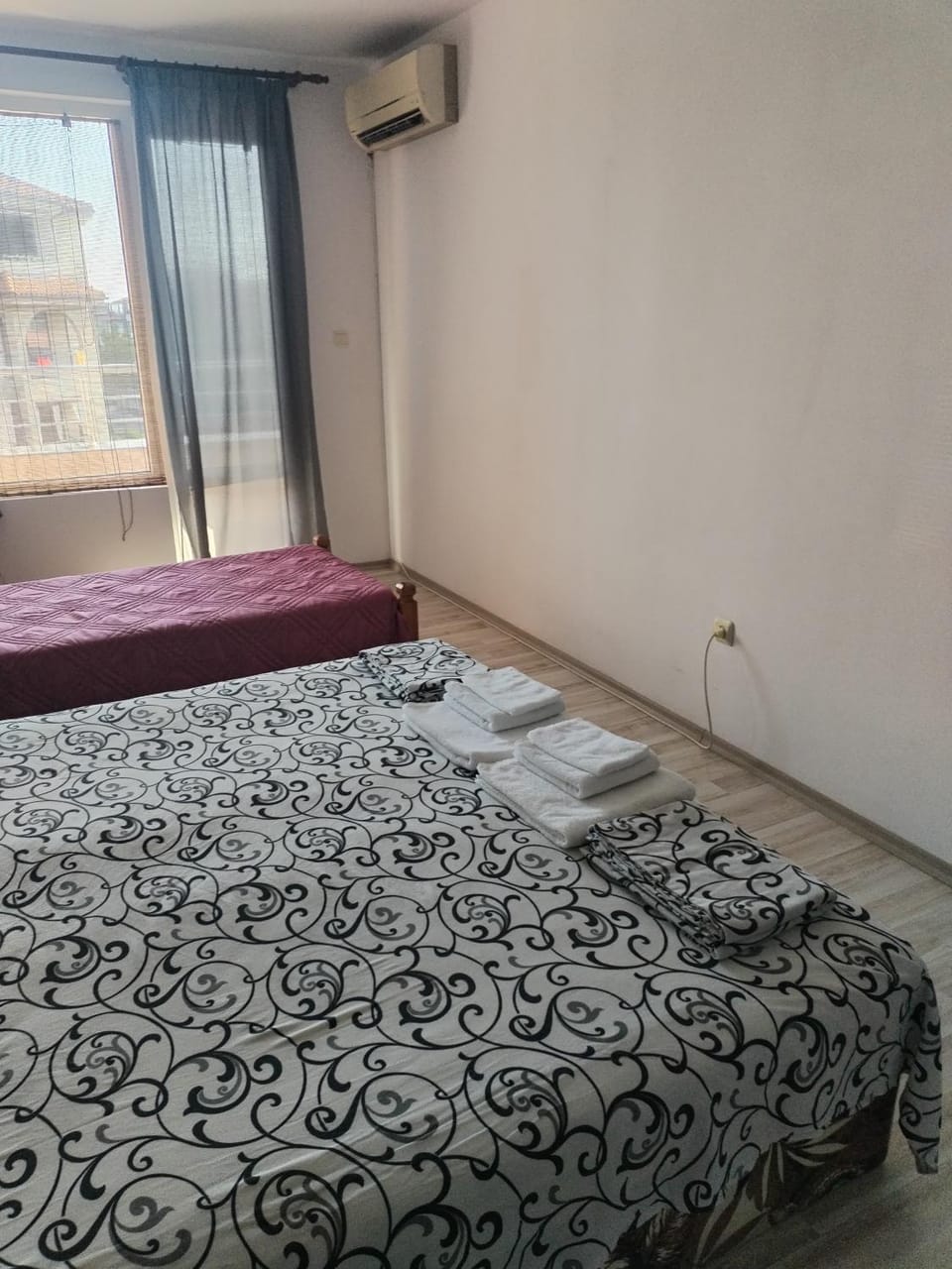 Bed, Photo of the whole room, Bedroom, towels, air conditioner