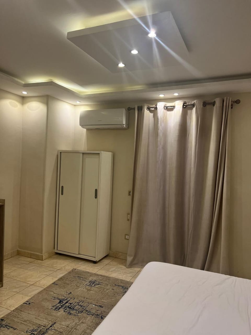 Photo of the whole room, wardrobe, air conditioner