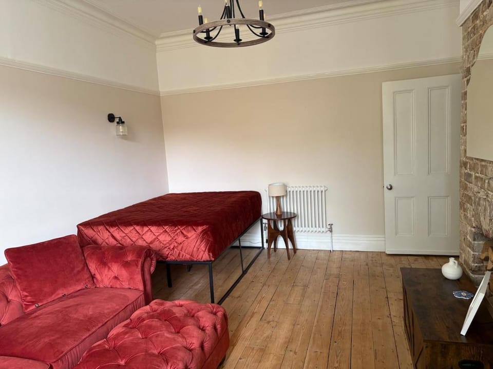 Bed, Living room, Seating area