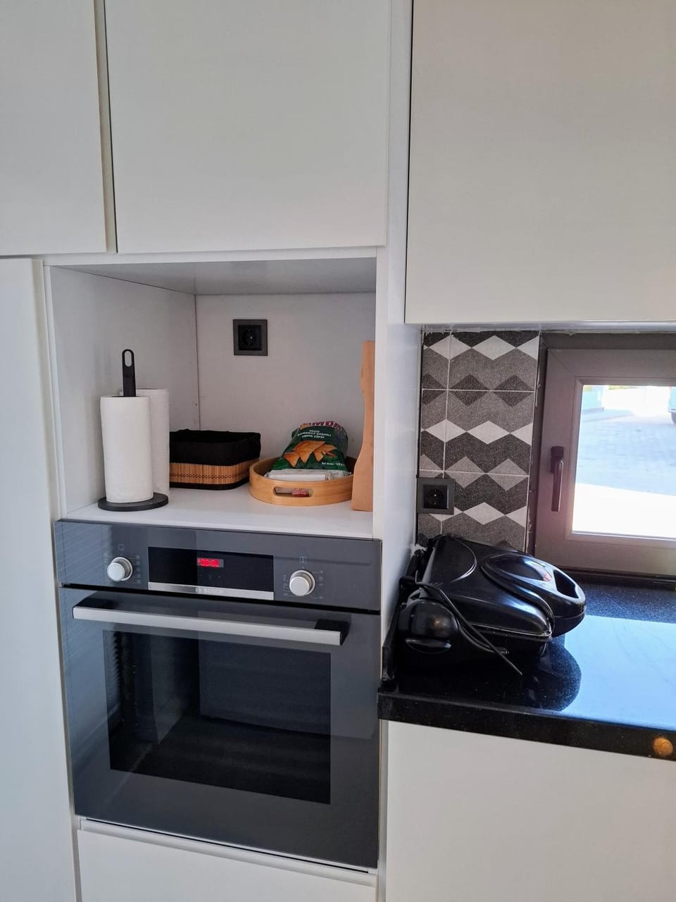 Kitchen or kitchenette, oven