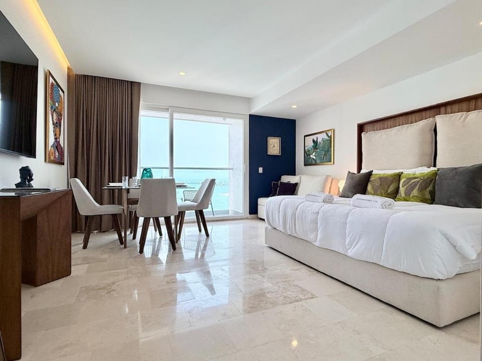 Bed, TV and multimedia, Living room, Photo of the whole room, Seating area, Bedroom