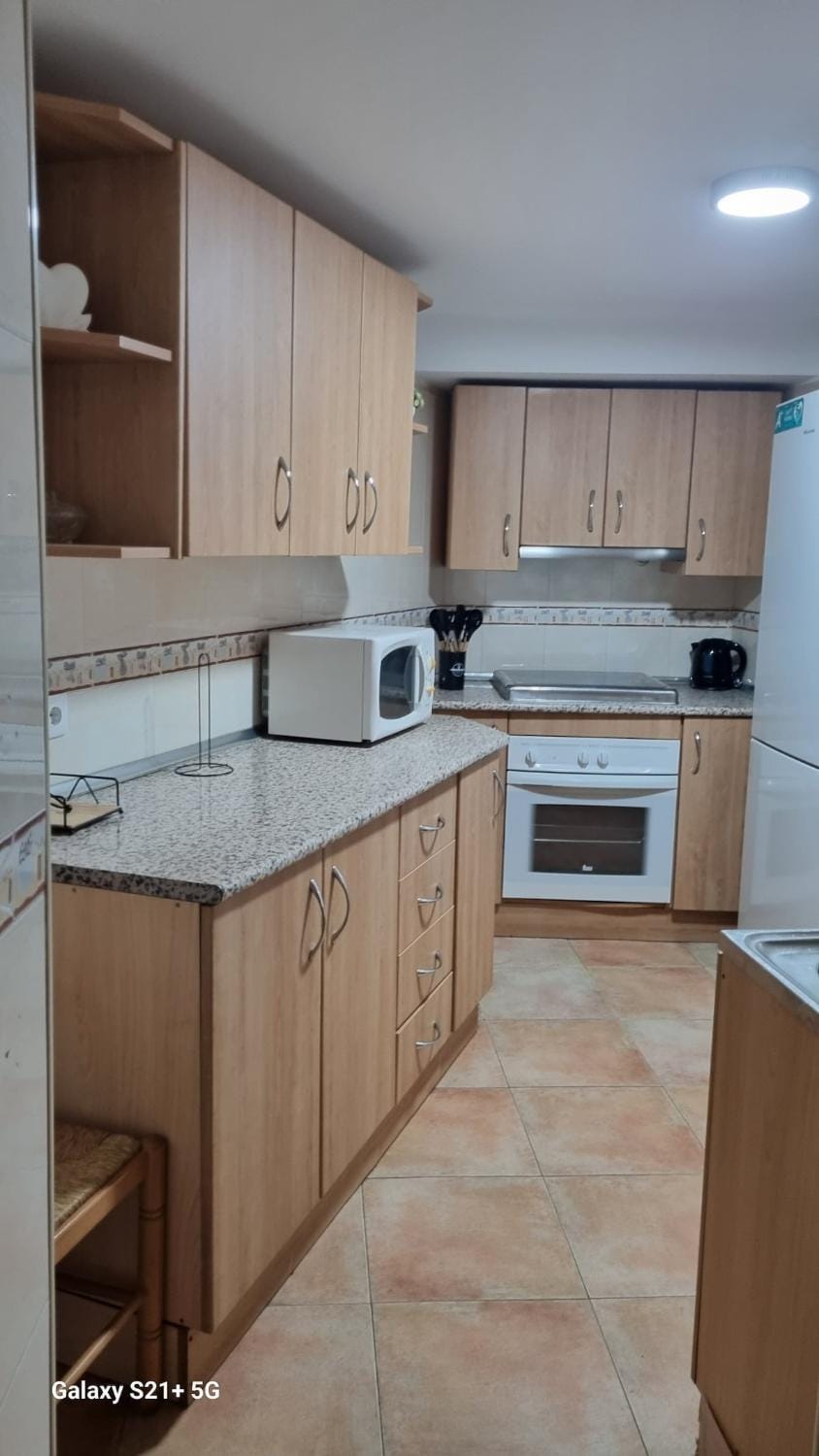 Kitchen or kitchenette, oven, stove