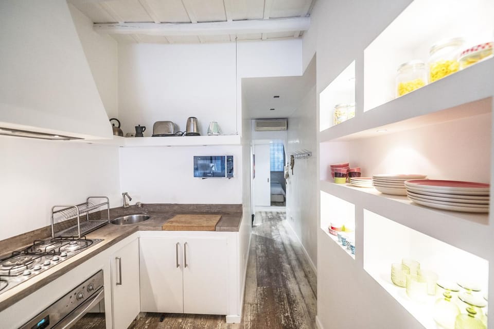 Kitchen or kitchenette, oven, stove