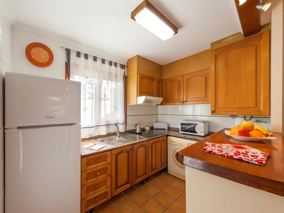 Kitchen or kitchenette, dishwasher, oven, stove, toaster