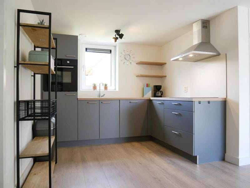 Kitchen or kitchenette, dishwasher, oven, stove
