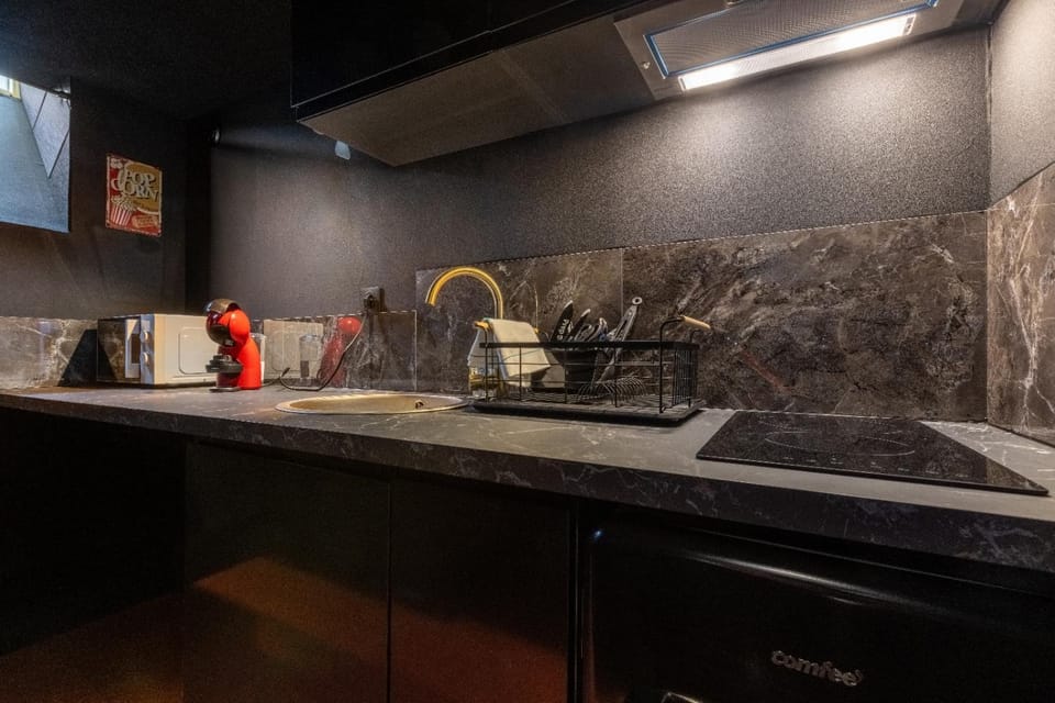 Kitchen or kitchenette, stove