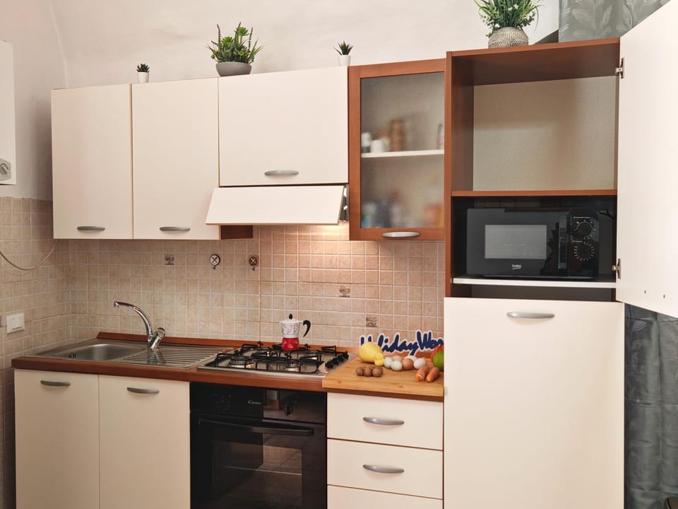 Kitchen or kitchenette, stove