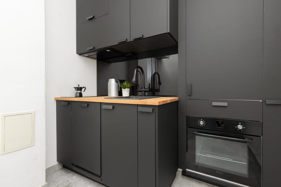Kitchen or kitchenette, oven