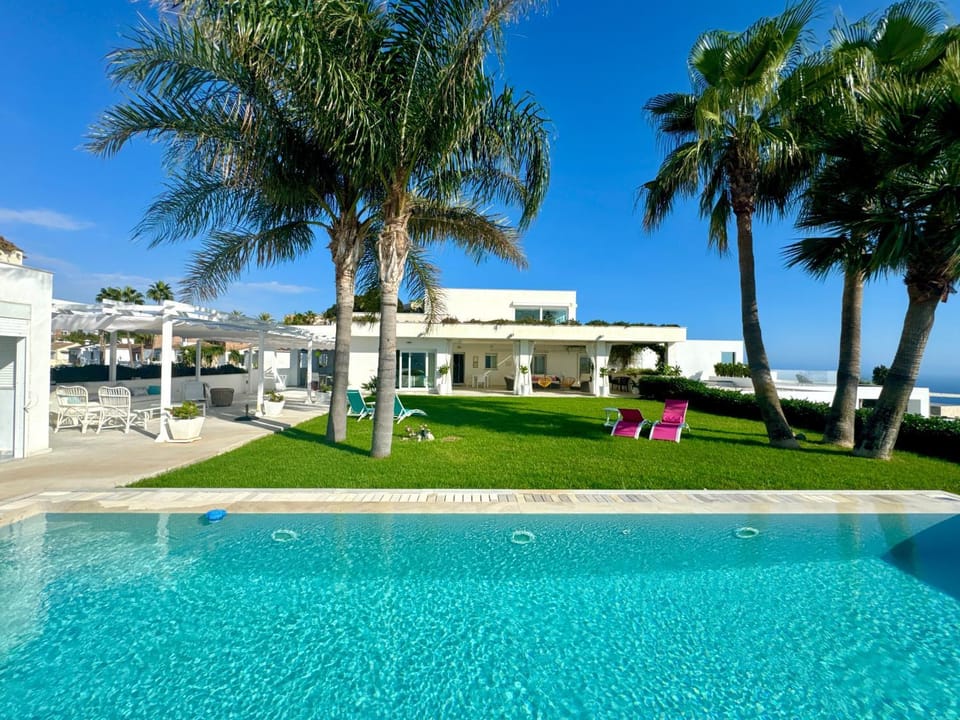 Property building, Living room, Swimming pool
