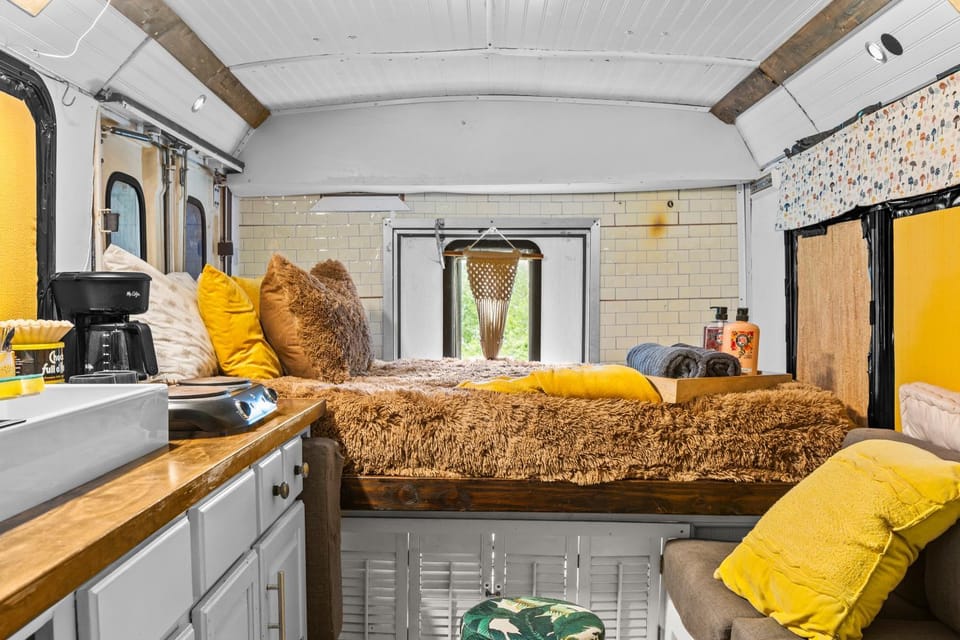 Covered Bridge Tiny Home Bus on the water in RRG House in Kentucky